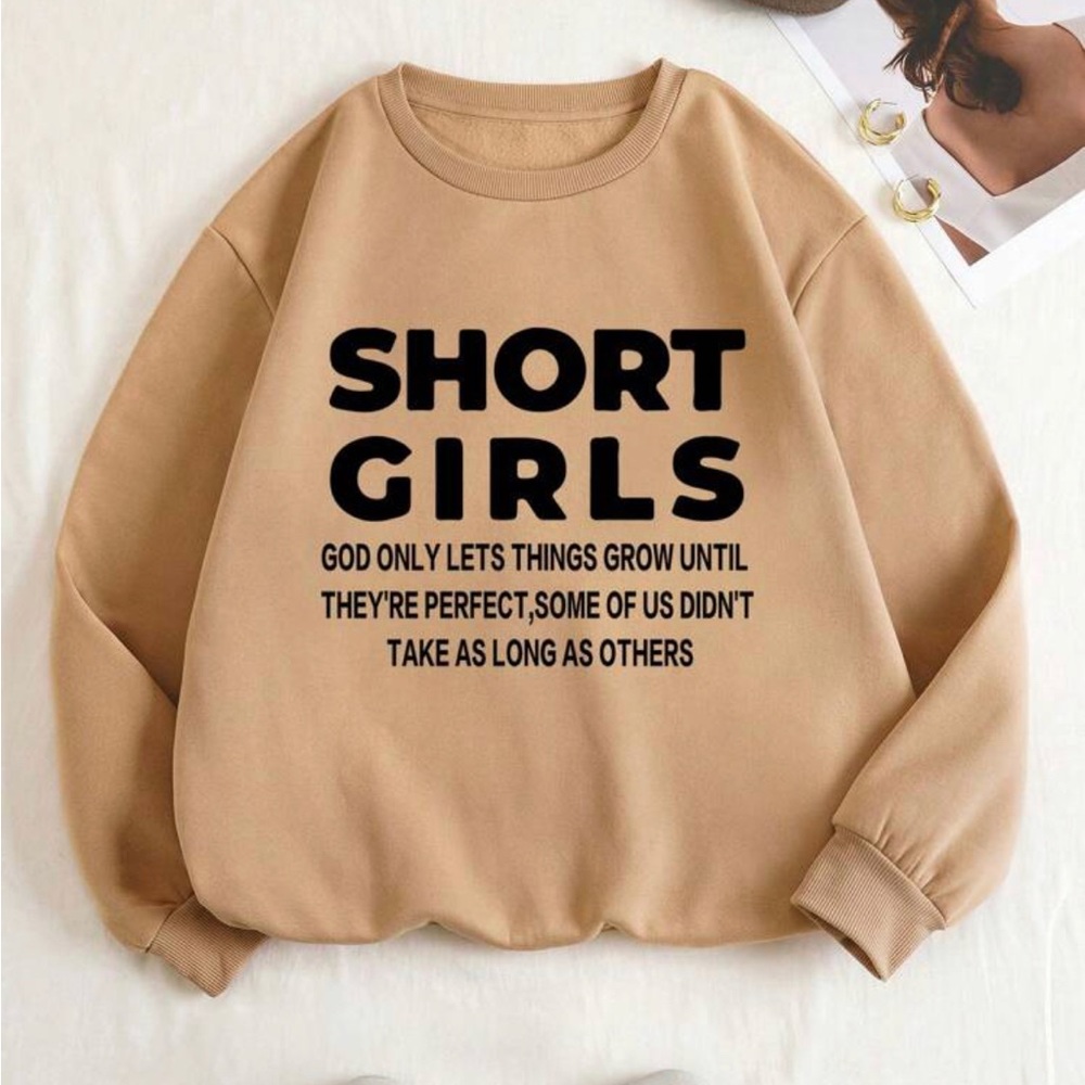 A small sized 4. Never worn. Khaki color with black lettering.